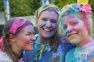 A trio of New Year's Eve Girls hanging out after a Colour Run